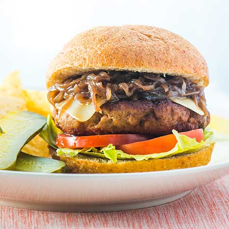 Backyard Burgers with Grape Jelly Caramelized Onions