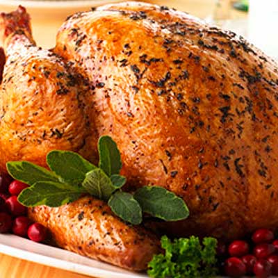 Fresh Thyme-Rubbed Turkey with White Cranberry Baste